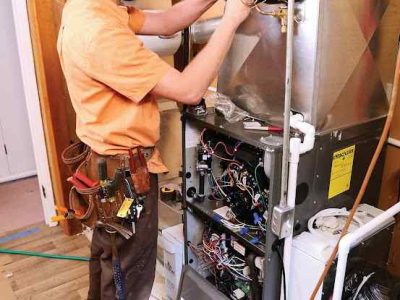 technician-installing-furnace